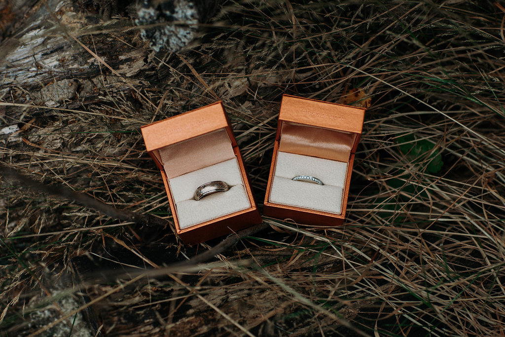 Wedding rings in orange boxes