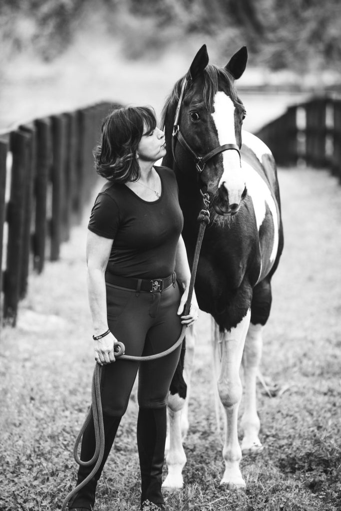 A lady and her horse during an equine photography session in Ocala, Florida by Adina Preston Photography weddingsbyadina.com