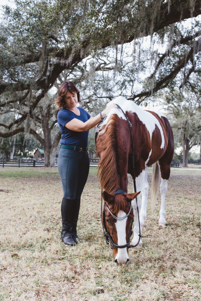 A lady and her horse during an equine photography session in Ocala, Florida by Adina Preston Photography weddingsbyadina.com