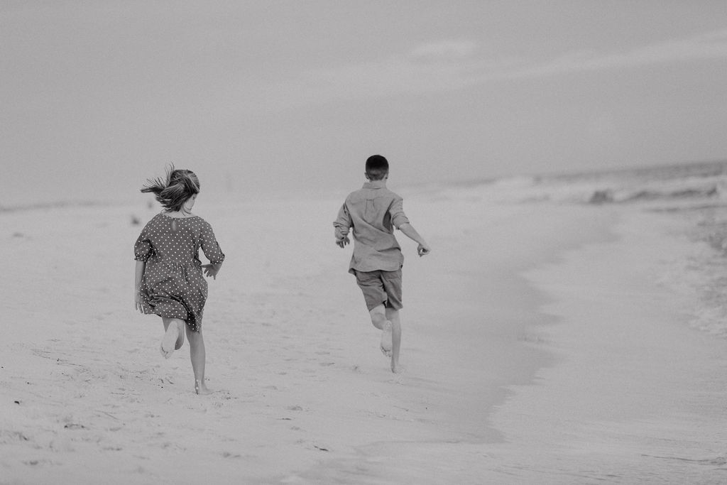 Navarre Beach Family Session at Sunset Kids Running on the Beach
