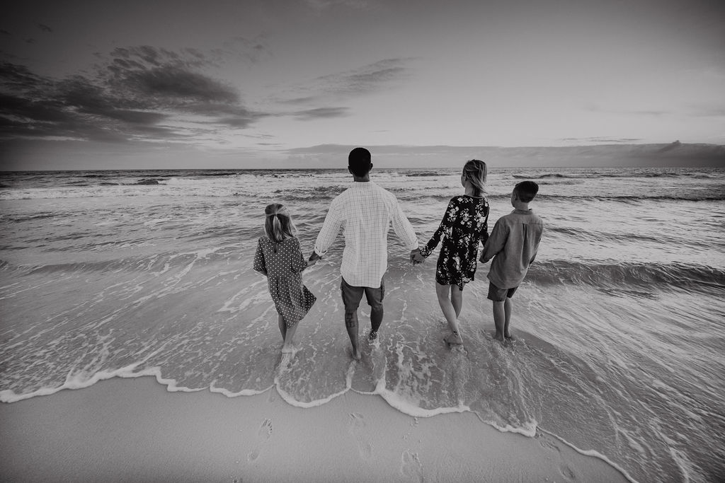 Family photo session at sunset on Navarre Beach