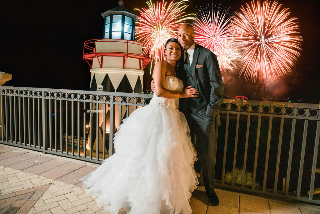 Wedding Portrait of a married couple during the Firework show at the Emerald Grande Resort in Destin, Florida. 