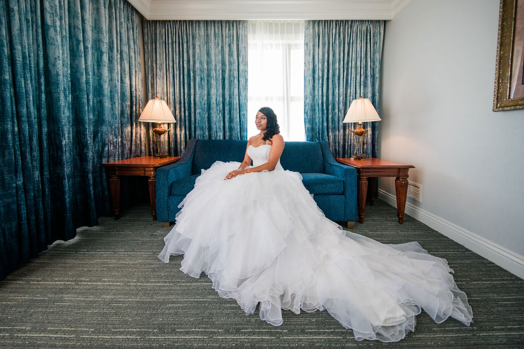 Portrait of a bride in a wedding suite at the Emerald Grande Resort in Destin, Florida