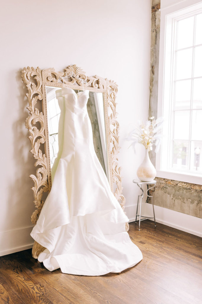 5-Eleven Palafox Bridal Suite - Wedding dress hanging on the mirror