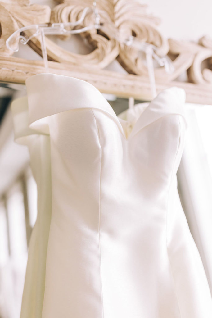 5-Eleven Palafox Bridal Suite - Close-up of the Wedding dress hanging on the mirror