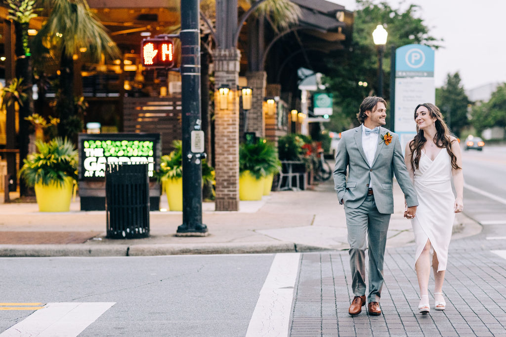 5-Eleven Palafox Bride and groom photos crossing Palafox downtown Pensacola