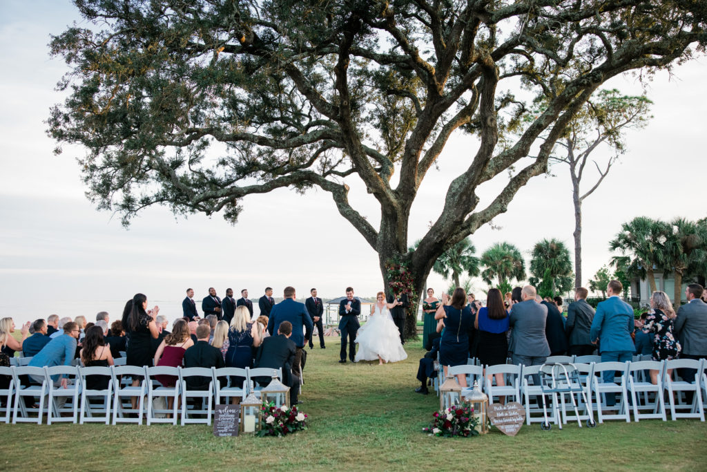 Wedding Ceremony at the Pensacola Country Club on the back lawn by the oak tree