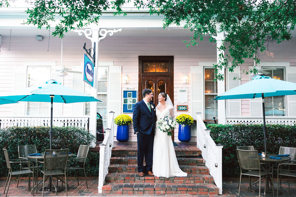 Dharma Blue Restaurant Pensacola wedding portraits in front of the restaurant