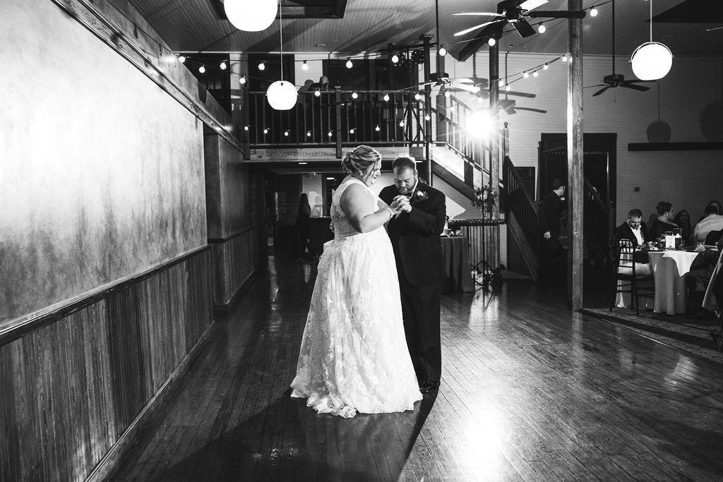 Palafox Wharf Waterfront Wedding event venue - bride and groom doing their first dance